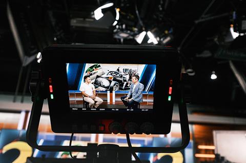 A photo of the camera view finder as Shawn is filmed while taking part in a television interview